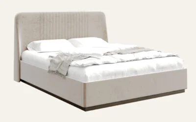 Elegant upholstered bed with soft linens